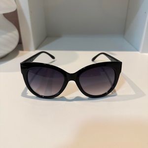Black sunglasses oversized cat eye shape, gold details, target